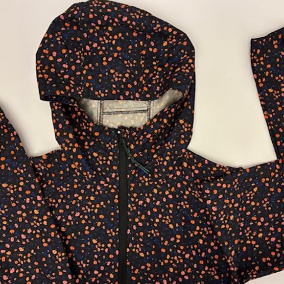 Herschel Voyage Hooded Jacket size small navy blue with blue and orange flowers - Picture 1 of 5